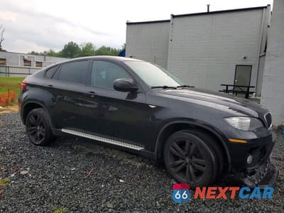 Czwarte zdjęcie samochodu z boku: 2014 BMW X6 XDRIVE35I VIN:5UXFG2C53E0H09944 - miniatura