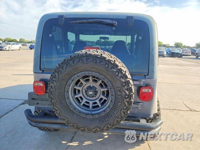 Zdjęcie 6 z 12 samochodu: 2001 JEEP WRANGLER / TJ SPORT VIN:1J4FA49SX1P338558 - miniatura