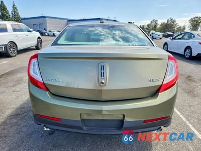 Zdjęcie 6 z 12 samochodu: 2013 LINCOLN MKS VIN:1LNHL9DK4DG603925 - miniatura