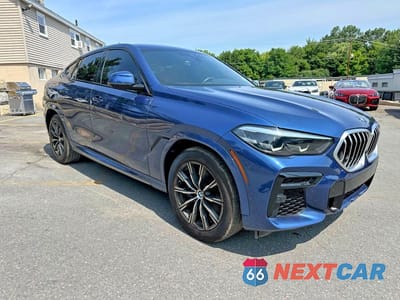 Czwarte zdjęcie samochodu z boku: 2022 BMW X6 XDRIVE40I VIN:5UXCY6C08N9L59277 - miniatura