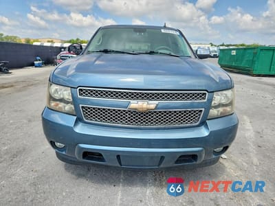 Piąte zdjęcie samochodu w środku: 2010 CHEVROLET SUBURBAN C1500 LT VIN:1GNUCJE0XAR164240 - miniatura
