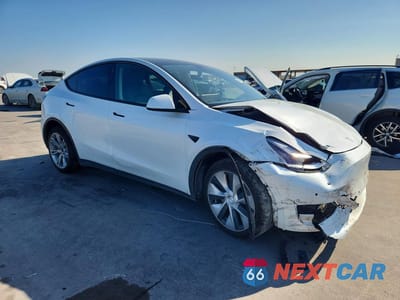 Czwarte zdjęcie samochodu z boku: 2022 TESLA MODEL Y VIN:7SAYGDEE2NF371652 - miniatura