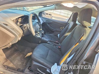 Zdjęcie 7 z 12 samochodu: 2018 FORD FOCUS S VIN:1FADP3E28JL220369 - miniatura