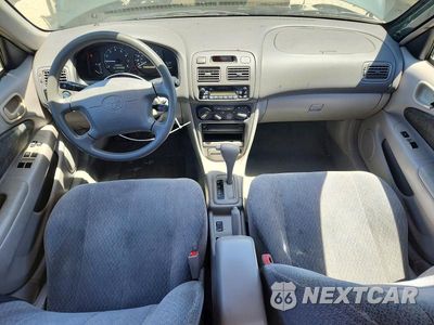 Zdjęcie 8 z 12 samochodu: 2001 TOYOTA COROLLA LE VIN:1NXBR12E01Z460844 - miniatura