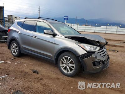 Czwarte zdjęcie samochodu z boku: 2015 HYUNDAI SANTA FE SPORT 2.0T VIN:5XYZUDLA3FG275470 - miniatura