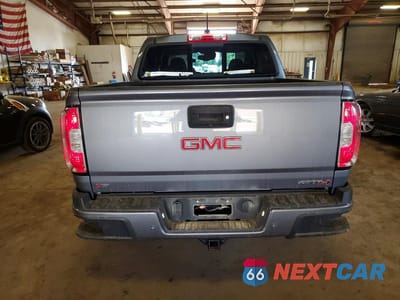 Zdjęcie 6 z 12 samochodu: 2021 GMC CANYON AT4 VIN:1GTG6FEN4M1106665 - miniatura