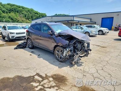 Czwarte zdjęcie samochodu z boku: 2014 HYUNDAI TUCSON SE VIN:KM8JUCAG9EU916323 - miniatura