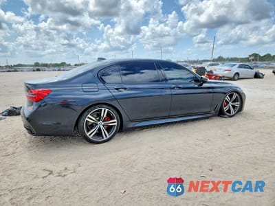 Trzecie zdjęcie samochodu z tyłu: 2019 BMW 740 I VIN:WBA7E2C56KB217432 - miniatura