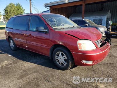 Czwarte zdjęcie samochodu z boku: 2004 FORD FREESTAR VIN:2FMZA52274BB21415 - miniatura