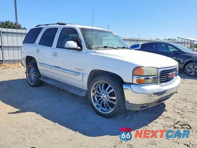 Czwarte zdjęcie samochodu z boku: 2002 GMC YUKON VIN:1GKEC13T42R131783 - miniatura