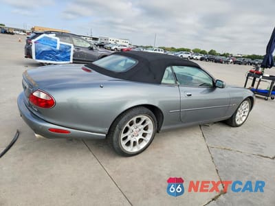 Trzecie zdjęcie samochodu z tyłu: 2002 JAGUAR XKR VIN:SAJDA42B12PA25783 - miniatura