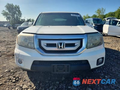 Piąte zdjęcie samochodu w środku: 2011 HONDA PILOT EXL VIN:5FNYF4H67BB060668 - miniatura