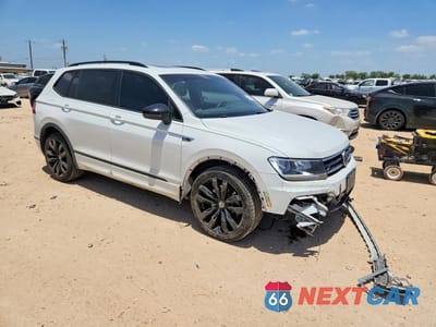 Czwarte zdjęcie samochodu z boku: 2021 VOLKSWAGEN TIGUAN SE VIN:3VV3B7AX6MM011049 - miniatura