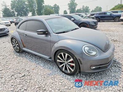 Czwarte zdjęcie samochodu z boku: 2012 VOLKSWAGEN BEETLE TURBO VIN:3VWV67AT7CM666051 - miniatura