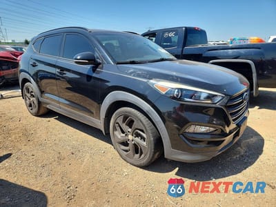 Czwarte zdjęcie samochodu z boku: 2016 HYUNDAI TUCSON LIMITED VIN:KM8J33A25GU068712 - miniatura