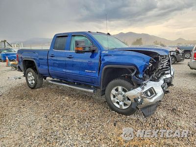 Czwarte zdjęcie samochodu z boku: 2019 GMC SIERRA K2500 SLE VIN:2GT22PEG1K1153558 - miniatura