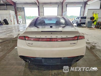 Zdjęcie 6 z 12 samochodu: 2015 LINCOLN MKZ VIN:3LN6L2J92FR612571 - miniatura