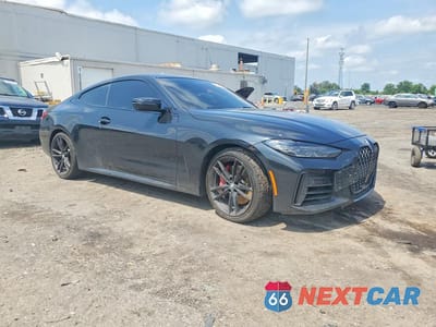 Czwarte zdjęcie samochodu z boku: 2022 BMW M440I VIN:WBA83AP04NCJ47284 - miniatura