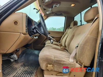 Zdjęcie 7 z 12 samochodu: 1999 CHEVROLET SILVERADO K1500 VIN:1GCEK14V9XE130674 - miniatura