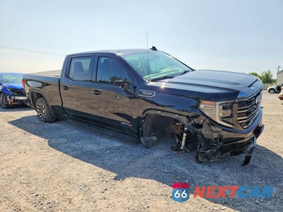 Czwarte zdjęcie samochodu z boku: 2022 GMC SIERRA K1500 AT4 VIN:1GTPUEEL4NZ609176 - miniatura