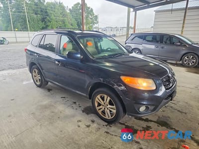 Czwarte zdjęcie samochodu z boku: 2011 HYUNDAI SANTA FE LIMITED VIN:5XYZK4AG2BG026004 - miniatura