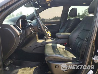 Zdjęcie 7 z 14 samochodu: 2014 JEEP GRAND CHEROKEE OVERLAND VIN:1C4RJFCT2EC174638 - miniatura