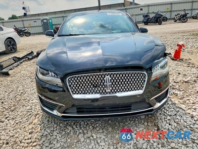 Piąte zdjęcie samochodu w środku: 2017 LINCOLN MKZ SELECT VIN:3LN6L5D99HR665381 - miniatura