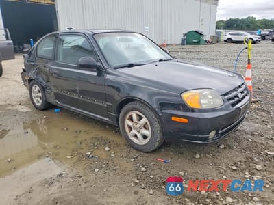 Czwarte zdjęcie samochodu z boku: 2004 HYUNDAI ACCENT GL VIN:KMHCG35C04U303951 - miniatura
