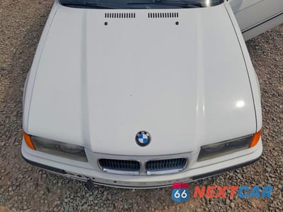 Zdjęcie 11 z 12 samochodu: 1994 BMW 325 IC AUTOMATIC VIN:WBABJ6322RJD35905 - miniatura
