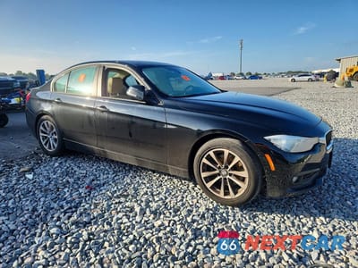 Czwarte zdjęcie samochodu z boku: 2017 BMW 320 I VIN:WBA8E1G3XHNU15655 - miniatura