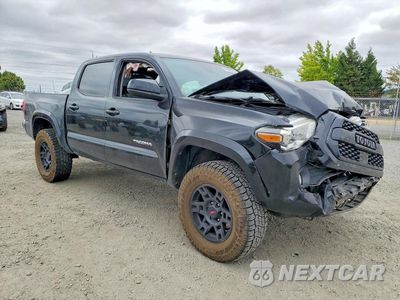 Czwarte zdjęcie samochodu z boku: 2019 TOYOTA TACOMA SR5 V6 VIN:3TMCZ5AN5KM196186 - miniatura