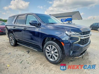 Czwarte zdjęcie samochodu z boku: 2023 CHEVROLET TAHOE K1500 LS VIN:1GNSKMKD0PR199879 - miniatura