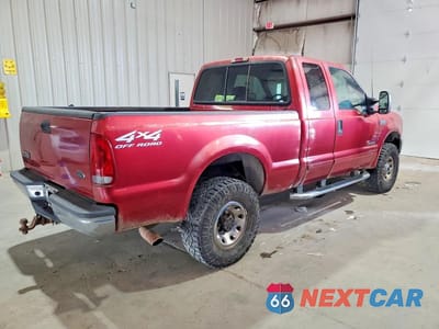 Trzecie zdjęcie samochodu z tyłu: 2002 FORD F250 SUPER DUTY VIN:1FTNX21F32ED05725 - miniatura