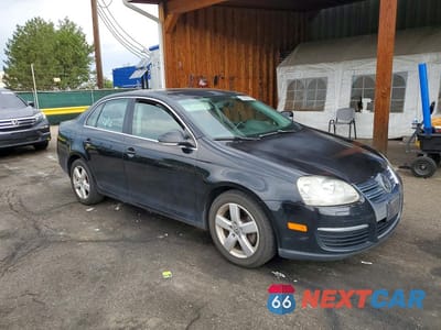 Czwarte zdjęcie samochodu z boku: 2009 VOLKSWAGEN JETTA SE VIN:3VWRM71K29M162210 - miniatura