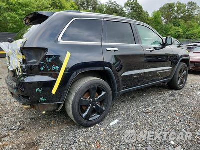 Trzecie zdjęcie samochodu z tyłu: 2015 JEEP GRAND CHEROKEE LIMITED VIN:1C4RJFBG8FC753882 - miniatura