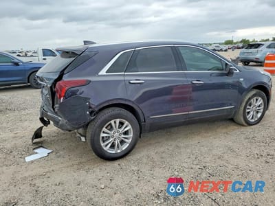 Trzecie zdjęcie samochodu z tyłu: 2025 CADILLAC XT5 LUXURY VIN:1GYKNAR41SZ136877 - miniatura