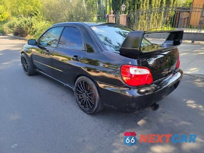 Trzecie zdjęcie samochodu z tyłu: 2004 SUBARU IMPREZA WRX STI VIN:JF1GD70694L521776 - miniatura