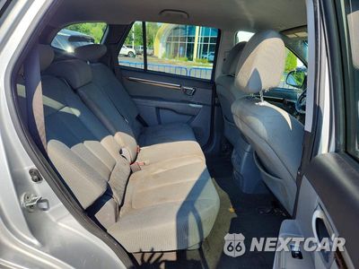 Zdjęcie 11 z 13 samochodu: 2012 HYUNDAI SANTA FE GLS VIN:5XYZGDAB0CG096995 - miniatura