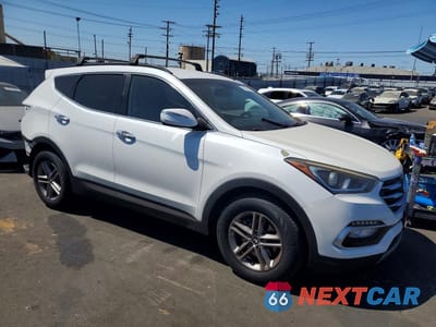 Czwarte zdjęcie samochodu z boku: 2018 HYUNDAI SANTA FE SPORT 2.4L VIN:5NMZU3LB9JH056742 - miniatura