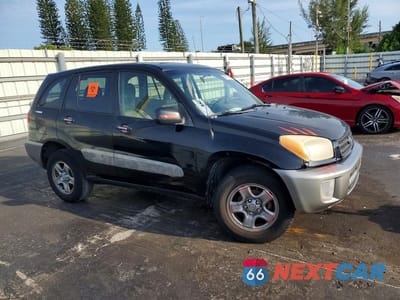 Czwarte zdjęcie samochodu z boku: 2002 TOYOTA RAV4 BASE VIN:JTEGH20V520074592 - miniatura