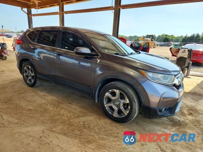 Czwarte zdjęcie samochodu z boku: 2017 HONDA CR-V EXL VIN:7FARW1H85HE002804 - miniatura