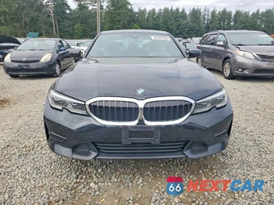 Piąte zdjęcie samochodu w środku: 2020 BMW 330XI VIN:3MW5R7J01L8B46210 - miniatura