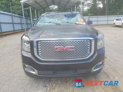 Piąte zdjęcie samochodu w środku: 2017 GMC YUKON DENALI VIN:1GKS1CKJ9HR263032 - miniatura