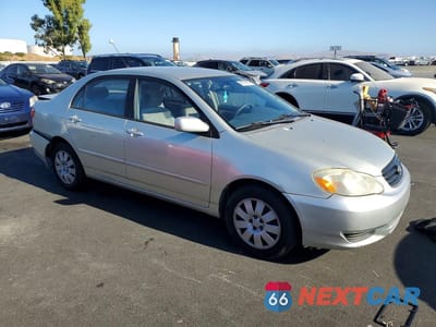 Czwarte zdjęcie samochodu z boku: 2003 TOYOTA COROLLA LE VIN:JTDBR32E230050329 - miniatura