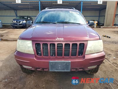 Piąte zdjęcie samochodu w środku: 1999 JEEP GRAND CHEROKEE LIMITED VIN:1J4GW68N0XC597654 - miniatura