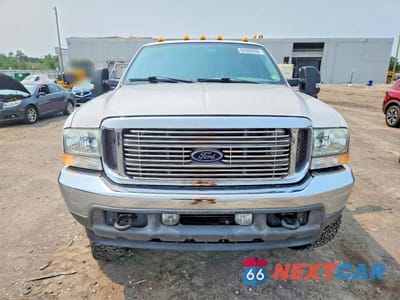 Piąte zdjęcie samochodu w środku: 2002 FORD F250 SUPER DUTY VIN:1FTNF21L02EA10140 - miniatura