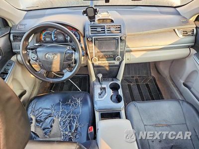 Zdjęcie 8 z 12 samochodu: 2013 TOYOTA CAMRY HYBRID LE VIN:4T1BD1FKXDU072250 - miniatura
