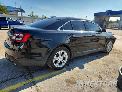 Trzecie zdjęcie samochodu z tyłu: 2016 FORD TAURUS SEL VIN:1FAHP2H88GG147002 - miniatura