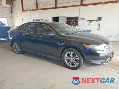 Czwarte zdjęcie samochodu z boku: 2015 FORD TAURUS SEL VIN:1FAH92H83FG168211 - miniatura