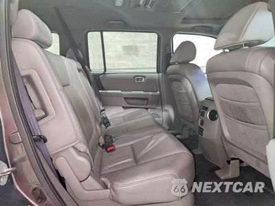 Zdjęcie 11 z 14 samochodu: 2011 HONDA PILOT EXL VIN:5FNYF4H65BB007354 - miniatura